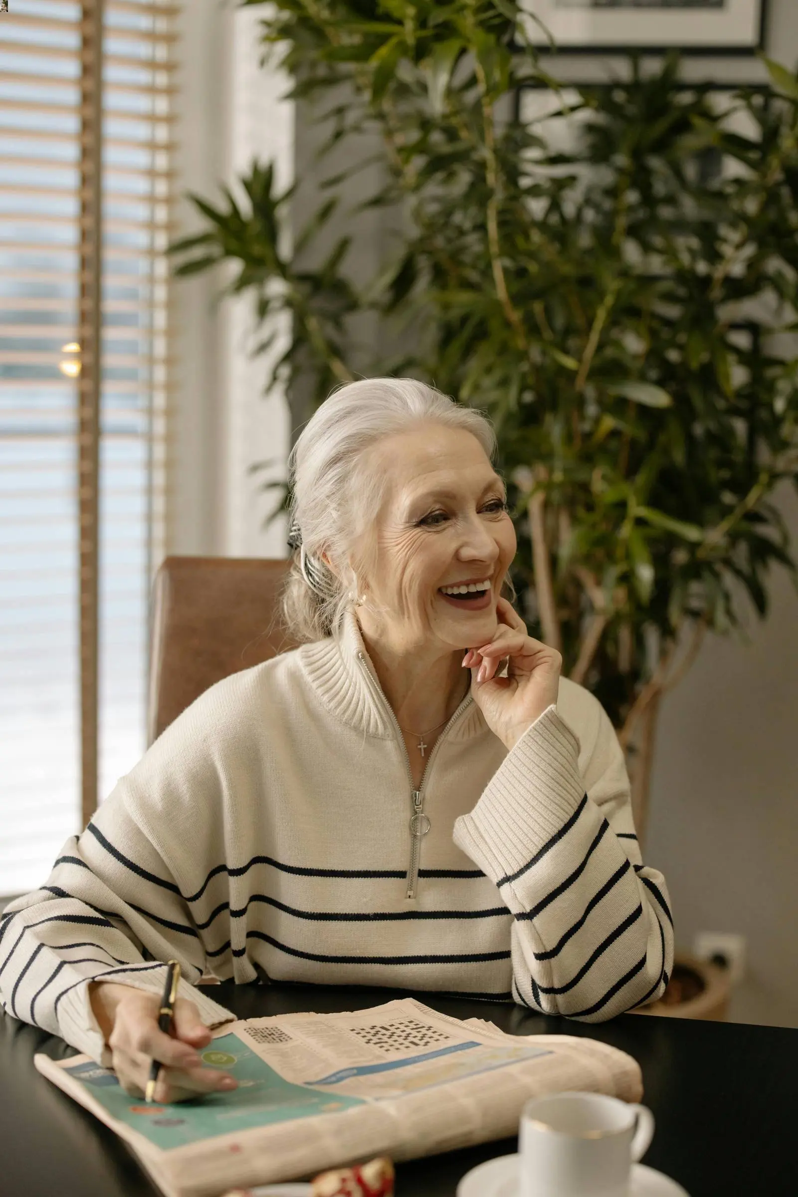 Caregiver providing companionship to a senior client at home